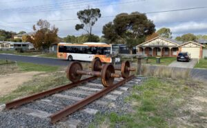 Modern public transport passes relics at Levy Stn site on Spencer St [2024]